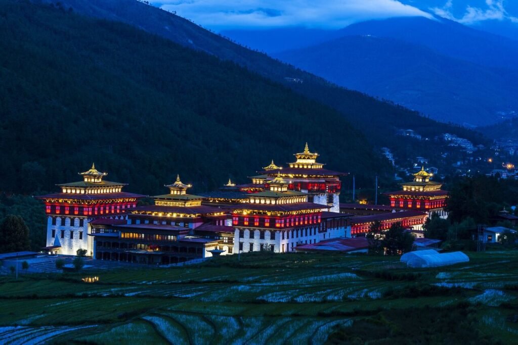 Places to visit in Thimphu 1 23 night view of the trashi chhu dzong in thimphu with rice fields